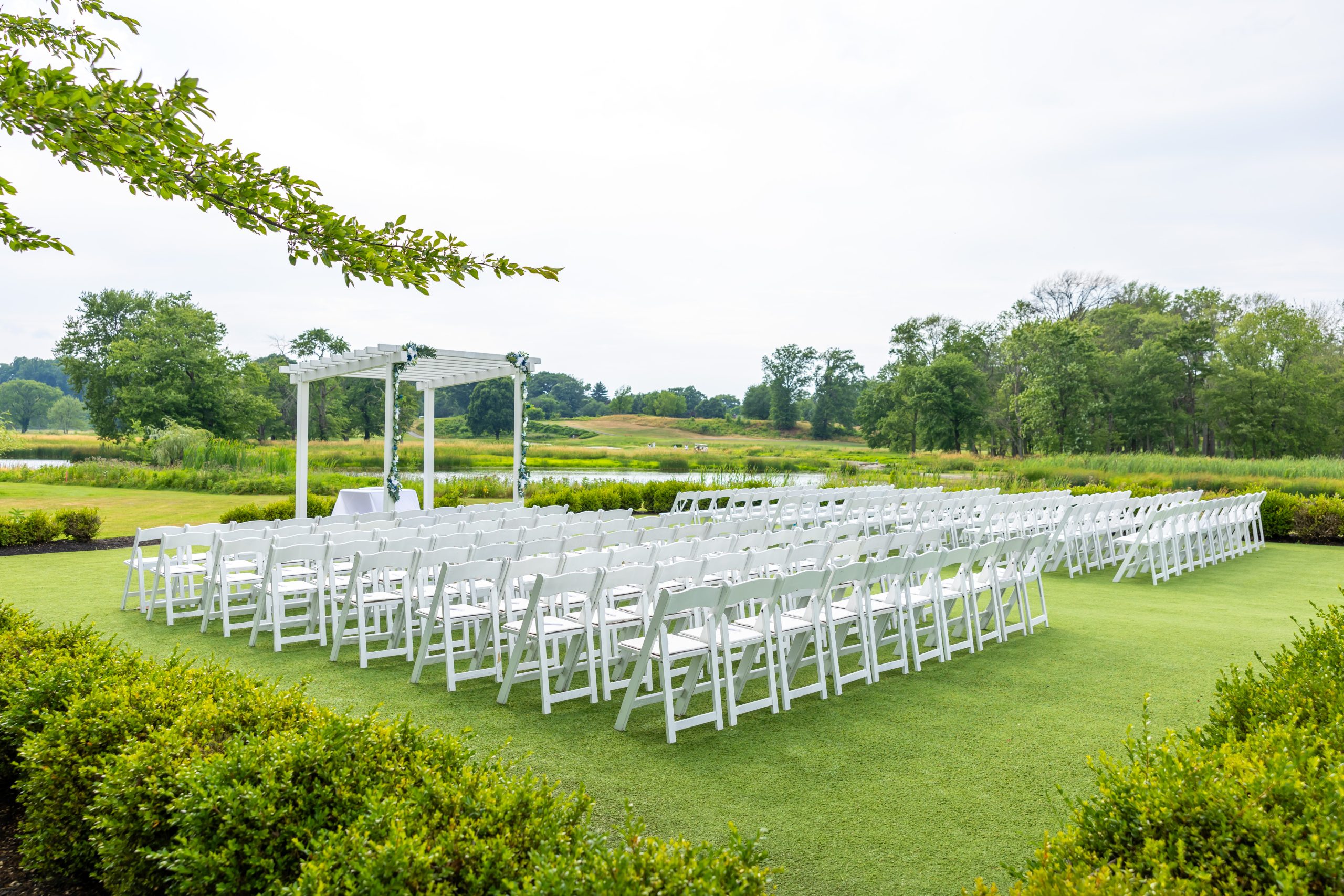 Outdoor wedding ceremony site at the golf course at The Clubhouse at Galloping Hill in Kenilworth, New Jersey