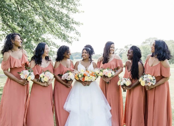 The bride and bridesmaids outdoors at The Clubhouse at Galloping Hill in Kenilworth, New Jersey